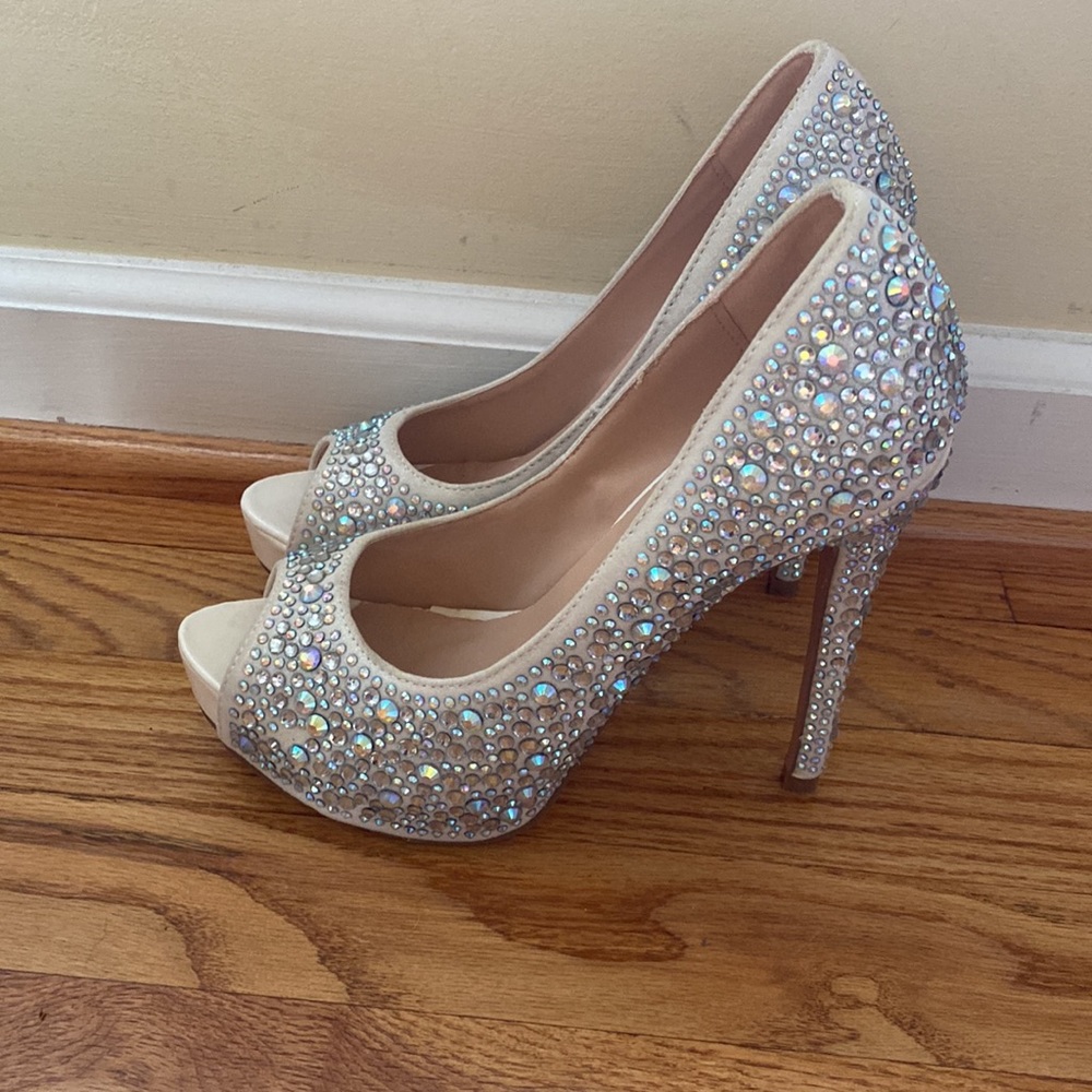 Bedazzled peep toe pumps